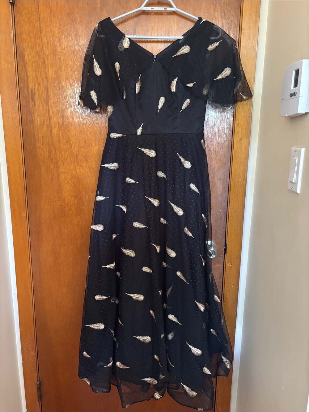 Black and gold midi dress